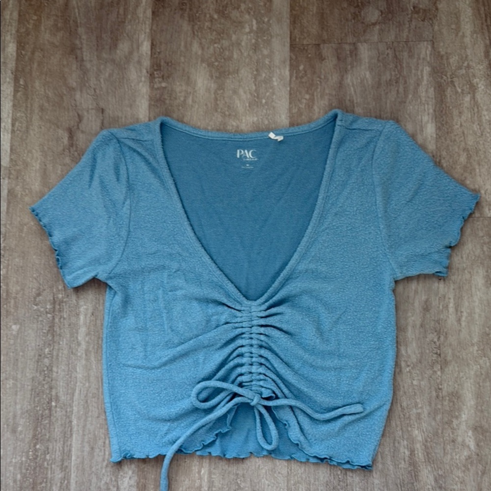 PAC Cares women’s light blue croptop